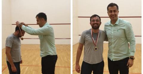 The Champion of Mens Squash Tournament